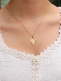 Médaille amour AUGIS coeur strié Plus qu'hier moins que demain or jaune rubis