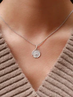 Médaille amour Augis ronde Plus qu'hier moins que demain or blanc diamant rubis