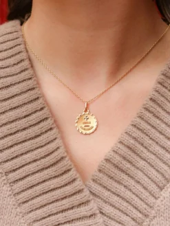 Médaille amour Augis ronde Plus qu’hier moins que demain or jaune rubis