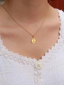 Médaille amour Augis ronde or jaune diamant rubis
