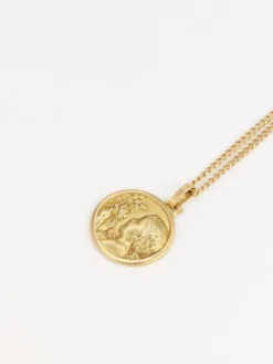 Médaille ancienne en or figurant la fillette à la rose
