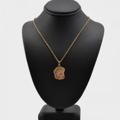 Médaille ancienne or rose polylobée