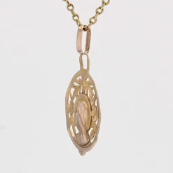 Médaille ancienne or rose ajourée