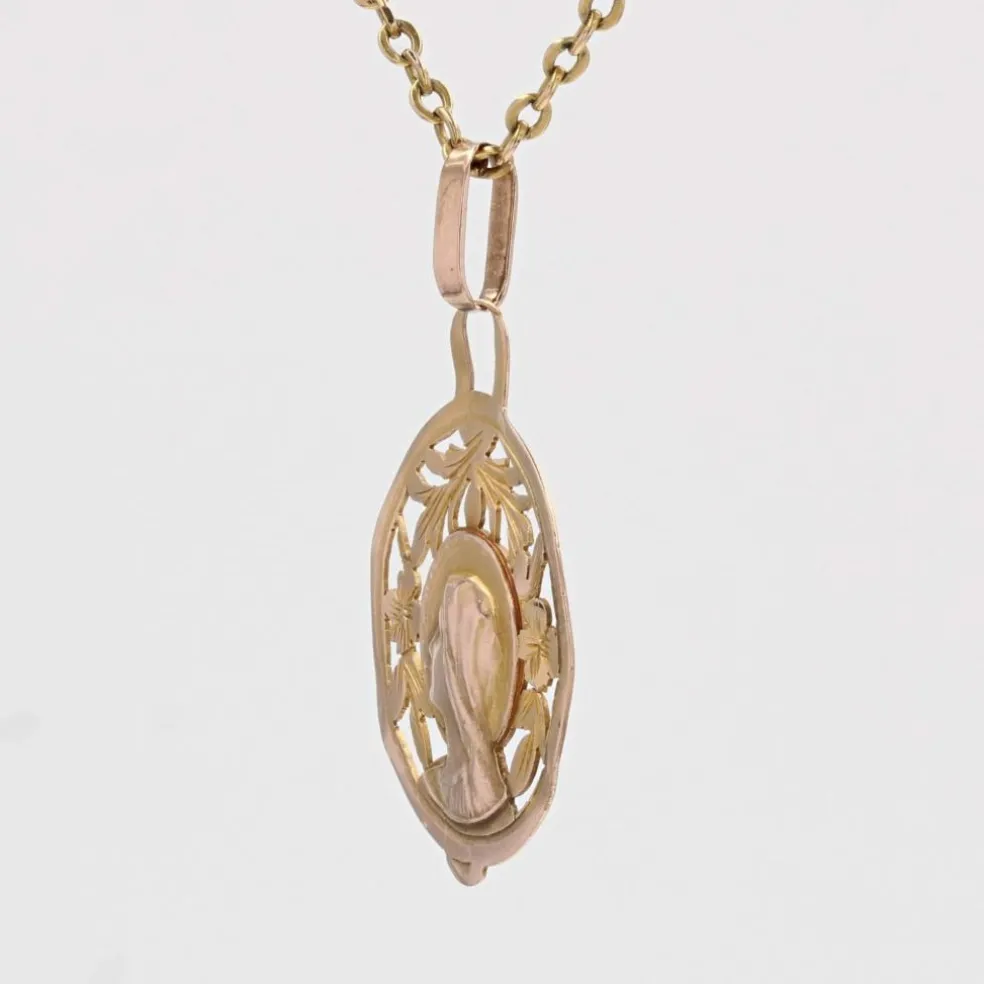 Médaille ancienne or rose ajourée