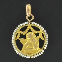 Médaille ange en or et perles fines