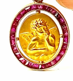Médaille ange en or jaune 18 carats, datée 1927