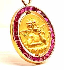 Médaille ange en or jaune 18 carats, datée 1927