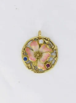 Médaille Art-Nouveau en or, émail, diamant, saphir et rubis
