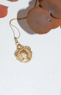 Médaille pivotante pièce romaine or