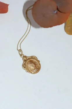 Médaille pivotante pièce romaine or
