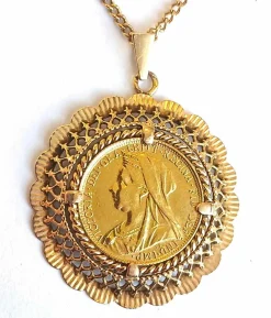 Médaille porte-pièce et sa chaîne en or jaune