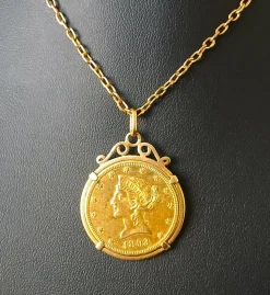 Médaille porte-pièce monnaie américaine, 10 dollars Liberty head.