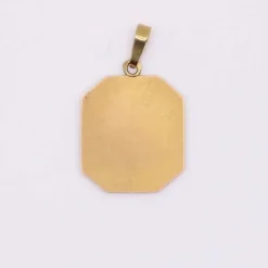 Médaille religieuse octogonale Vierge de profil auréolée d’or blanc