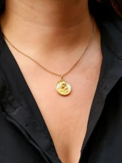 Médaille religieuse vintage nacre et or jaune