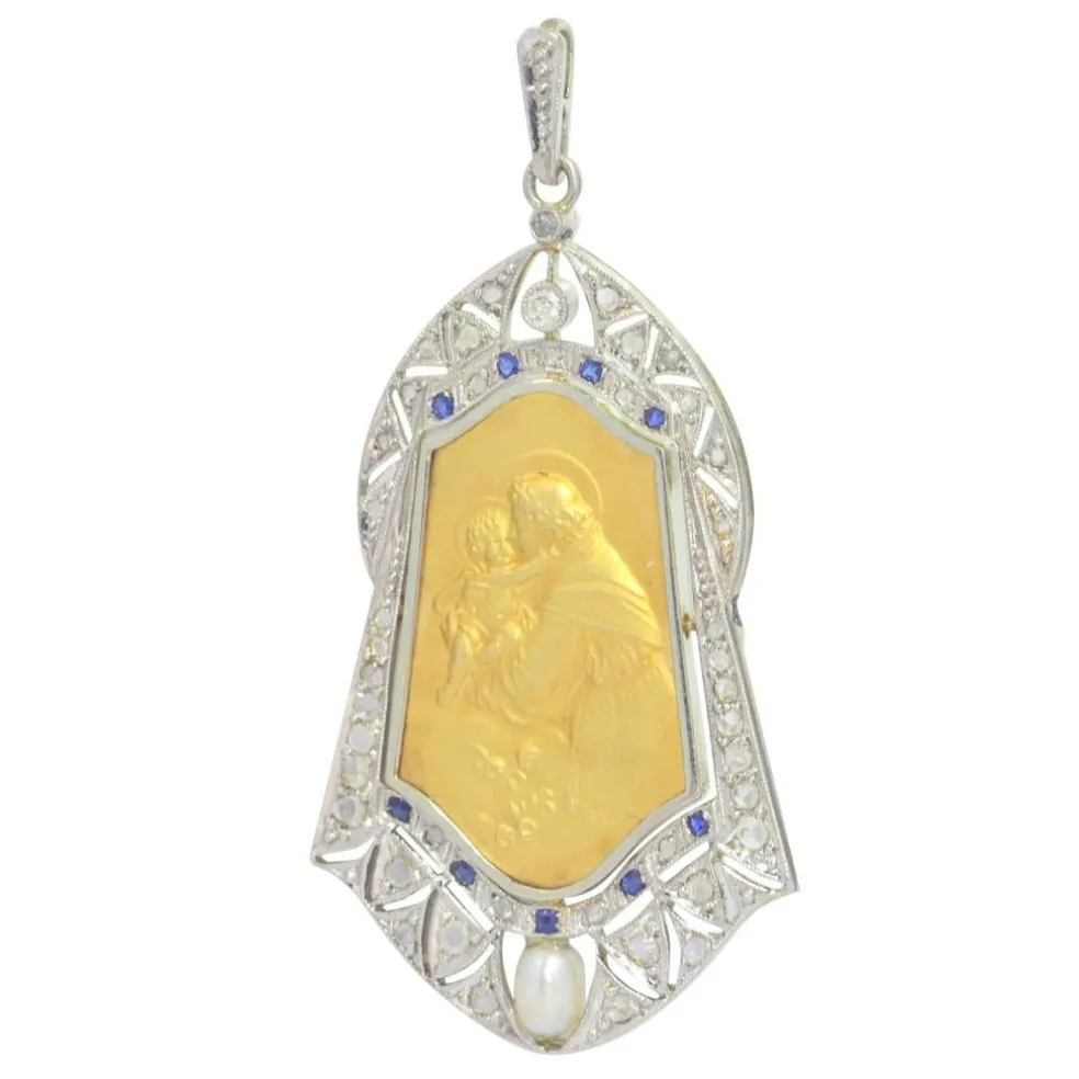 Médaille vintage des années 1910 Pendentif en or 18 carats serti de diamants, saphirs et perles Saint Antoine de Padoue représenté tenant l'Enfant Jésus