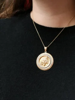 Médaille vintage en or jaune et blanc