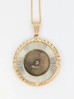 Médaille vintage en or jaune et blanc
