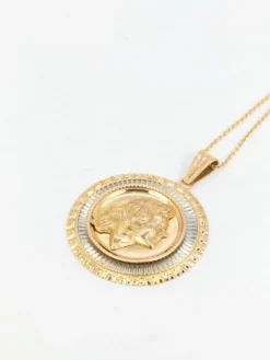 Médaille vintage en or jaune et blanc