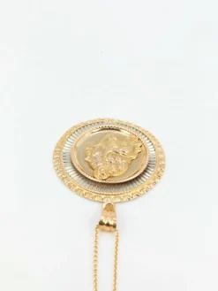 Médaille vintage en or jaune et blanc