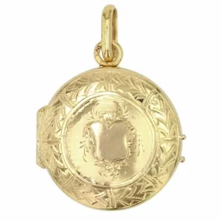 Médaillon ancien en or jaune ciselé
