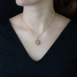 Médaillon ancien or rose ciselé diamant