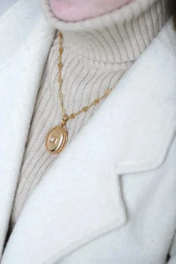 Médaillon ancien or rose et diamant