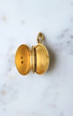 Médaillon ancien étoile or rose et or jaune, perles fines