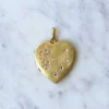 Médaillon cœur ouvrant en or, diamants, et perles