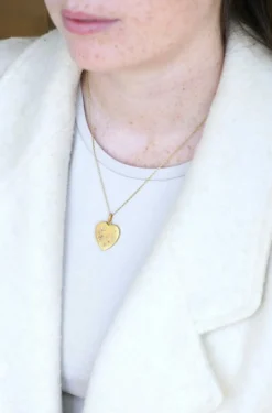 Médaillon cœur ouvrant en or, diamants, et perles