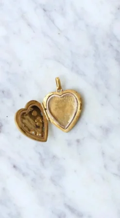 Médaillon cœur ouvrant en or, diamants, et perles