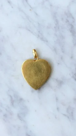 Médaillon cœur ouvrant en or, diamants, et perles