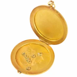 Médaillon porte-bonheur avec diamants