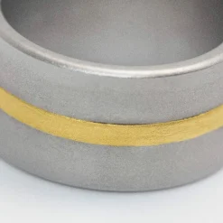 NIESSING - Bague FUSION en Or Jaune et Acier. Tout neuf