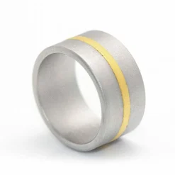 NIESSING - Bague FUSION en Or Jaune et Acier. Tout neuf