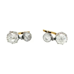 Paire de boucles d'oreilles dormeuses en or rose, platine et diamants taille ancienne.