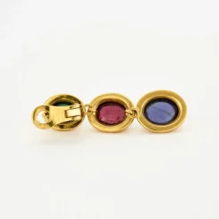 Paire de boucles d’oreilles sertie de pierres fines cabochon