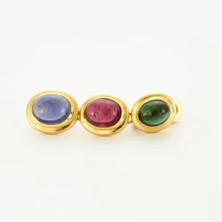 Paire de boucles d’oreilles sertie de pierres fines cabochon