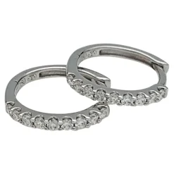 Paire de petites créoles en or blanc, diamants.