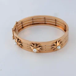 Parure en or jaune, perles