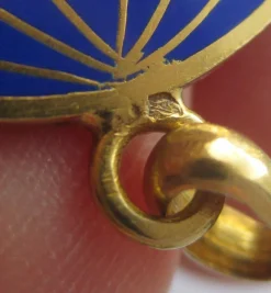 Pendentif ancien globe terrestre New York Life insurance Company émail