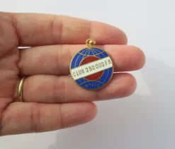 Pendentif ancien globe terrestre New York Life insurance Company émail