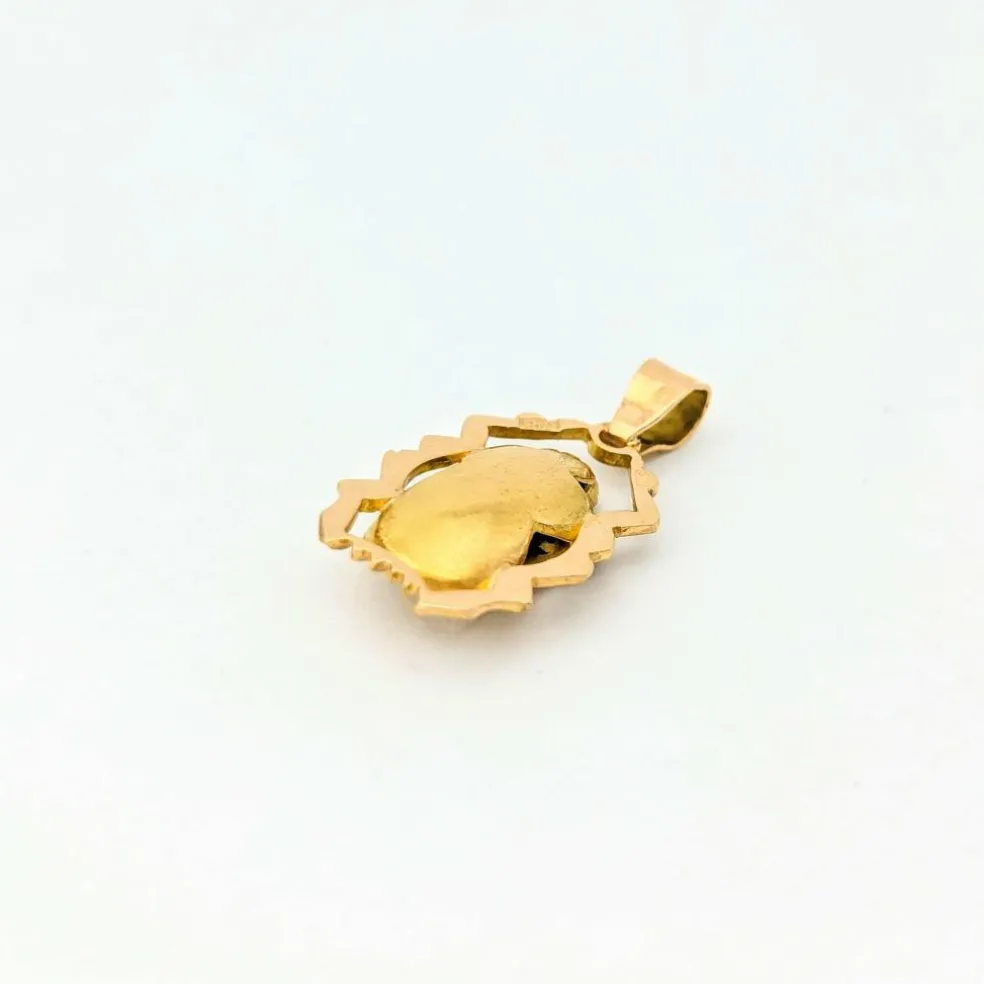 Pendentif animalier en or jaune et émeraudes