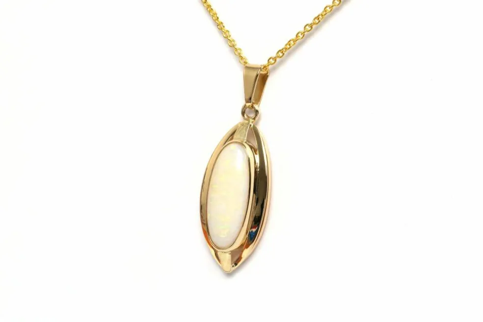 Pendentif années 70 or jaune, opale