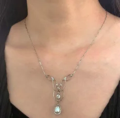 Pendentif Belle Époque en platine, perle fine et brillants