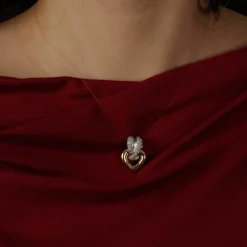 Pendentif bicolore avec pavé brillant