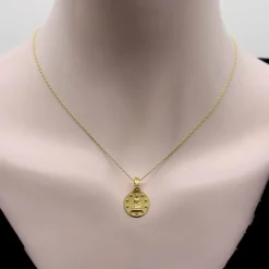 Pendentif Bouddha Orly Marcel en or jaune avec bélière en forme de fleur de diamant