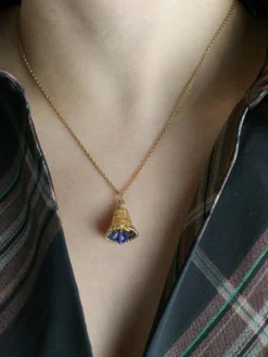 Pendentif charms vintage cloche or jaune pierre bleue