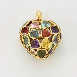 Pendentif coeur en or jaune et pierres