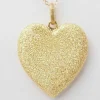 Pendentif Coeur sablé de Carolina BUCCI en or jaune