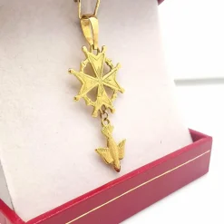 Pendentif croix en or